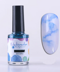 Flacon d'encre aquarelle bleu ciel 15 ml et son effet marbré sur un ongle