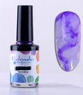 Flacon d'encre aquarelle violette 15 ml et son effet marbré sur un ongle