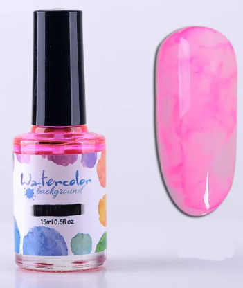 Flacon d'encre aquarelle rose fuchsia 15 ml et son effet marbré sur un ongle