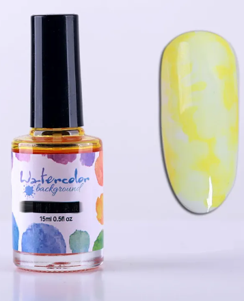 Flacon d'encre aquarelle jaune 15 ml et son effet marbré sur un ongle