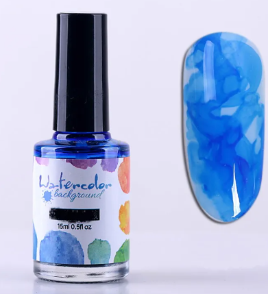Flacon d'encre aquarelle bleu roi 15 ml et son effet marbré cobalt sur un ongle