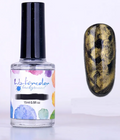 Flacon d'encre aquarelle or pailleté 15 ml et son effet doré sur un ongle