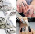 Feuille de transfert ongles à motif peau de serpent et ongles longs décorés