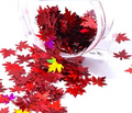 Pot de paillettes feuille d'érable rouge et cinq ongles nude décorés de feuilles